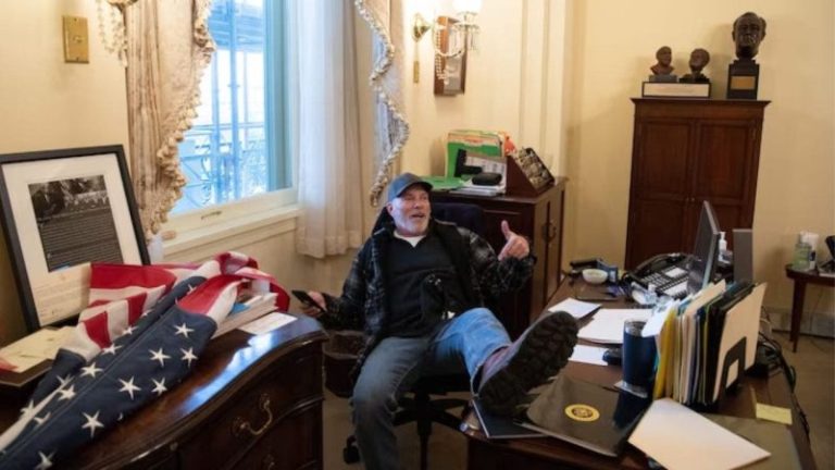 Capitol rioter who put feet on Pelosi’s desk regrets his ‘crass’ actions that brought ‘misery’ to family
