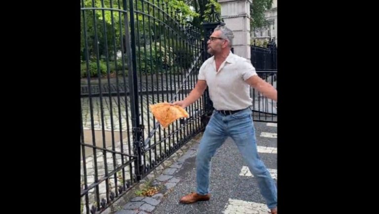 Conservative artist throws pizza at New York City Hall in response to coal-fired oven crackdown