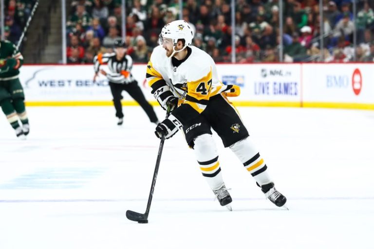 Police arrest man after on-ice death of hockey player