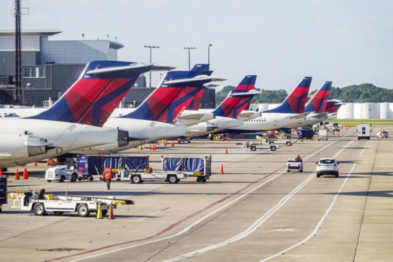 Delta cancels hundreds more flights as DOT opens probe