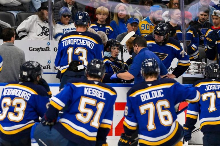Blues forward taken to hospital after taking puck to neck