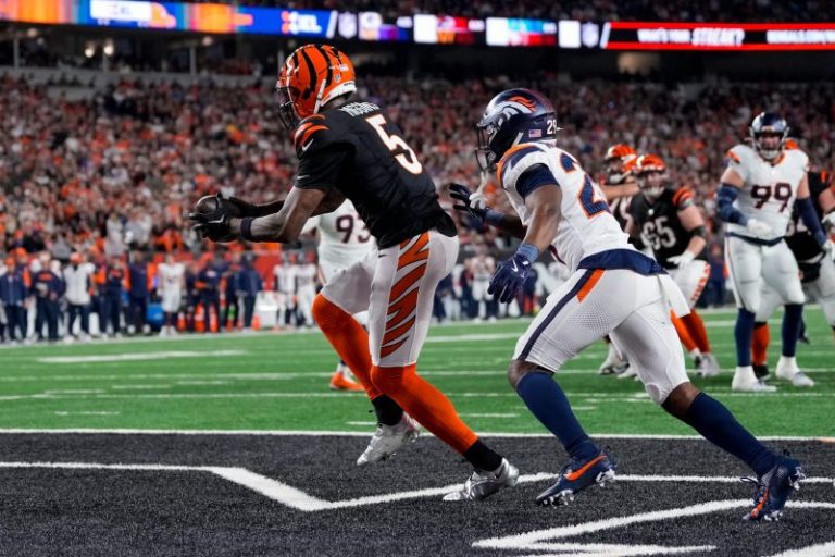 Burrow, Higgins keep Bengals’ chances alive with OT win