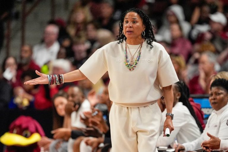 Dawn Staley’s March Madness fashion is on fire with chain from Plies