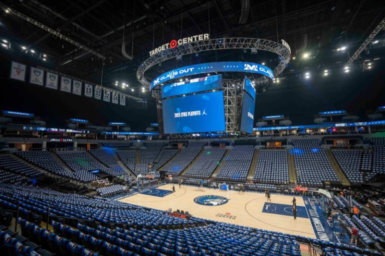 WNBA playoffs arrivals: Napheesa Collier serves in camouflage