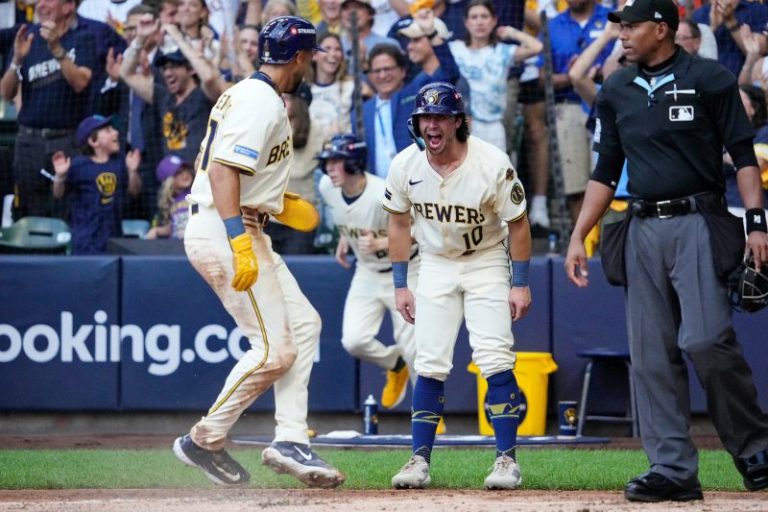 Brewers crush Cubs with early onslaught to begin MLB playoffs